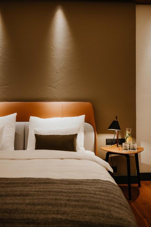 Do & Co Hotel Muenchen Exterior photo A bedroom at the hotel